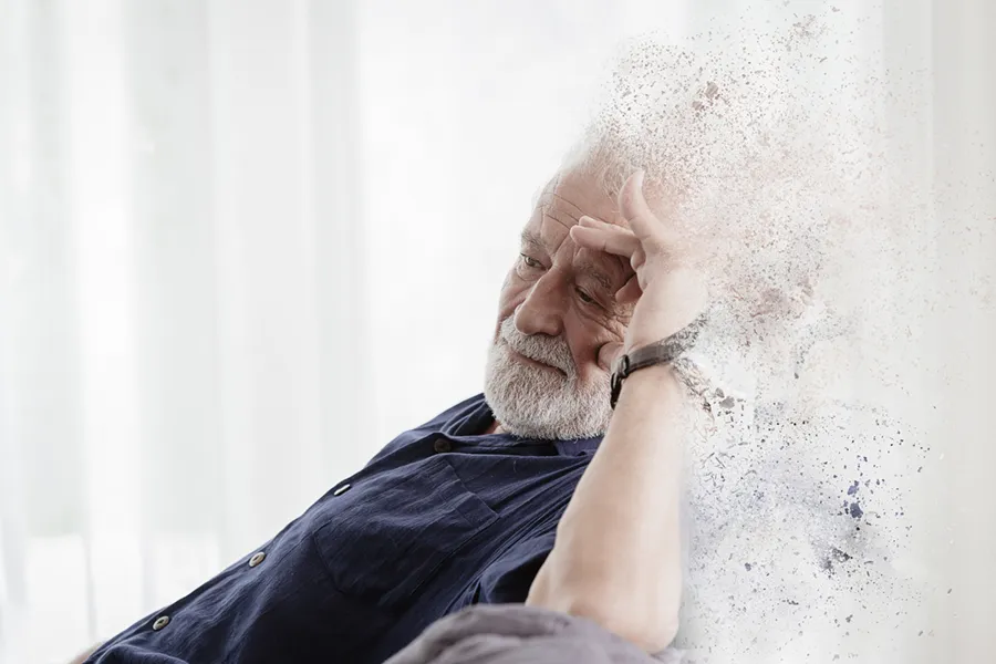 Cognitive-Decline-Clinic A mature man illustrated to blend with dust to signify cognitive decline. Schedule cognitive decline treatment from Marina Fay, PA-C in Aventura-North Miami.