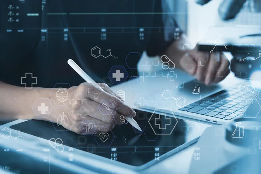 Health-Conditions-Treated-Doctor Close-up of a medical professional using a laptop and tablet, with illustrated medical symbols overlayed on the image, symbolizing health conditions treated by Marina Fay, PA-C in Aventura-North Miami.