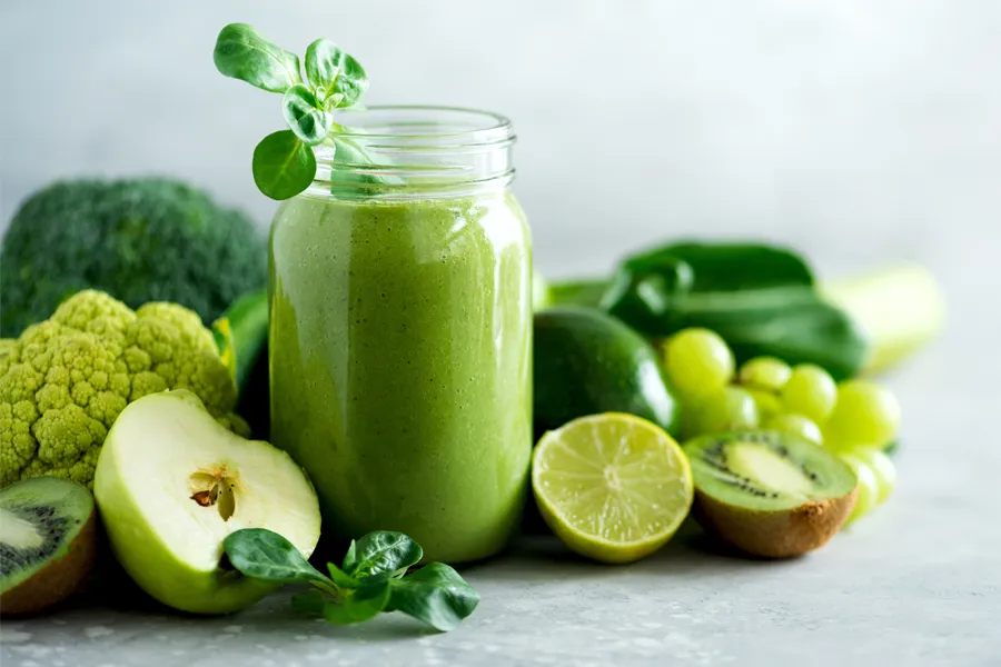 Nutritional-Counseling-Clinic A tableau of healthy green fruits and vegetables and juices. Get nutritional counseling from Marina Fay, PA-C in Aventura-North Miami.