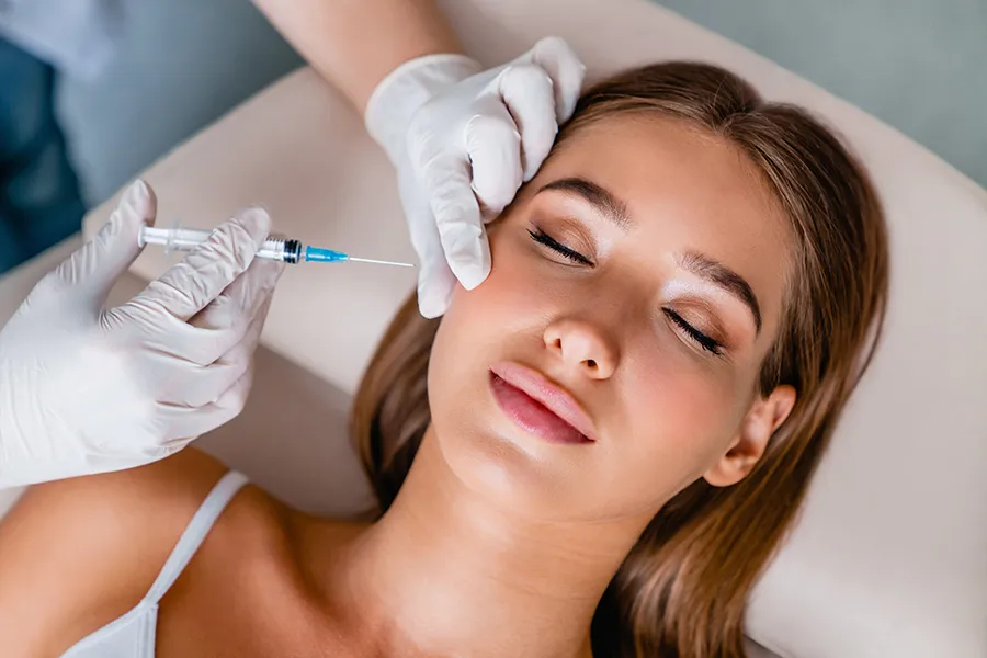 PRF-Facial-Injections-Clinic A woman getting facial injections. Schedule PRF facial injections from Marina Fay, PA-C in Aventura-North Miami.
