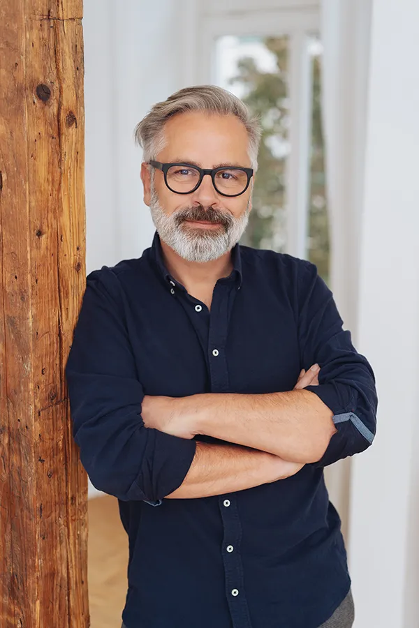 Red-Light-Therapy-for-Hair-Restoration-Treatment A mature man with thick silver hair and beard. Schedule Red Light Therapy for Hair Restoration with Marina Fay, PA-C in Aventura-North Miami.