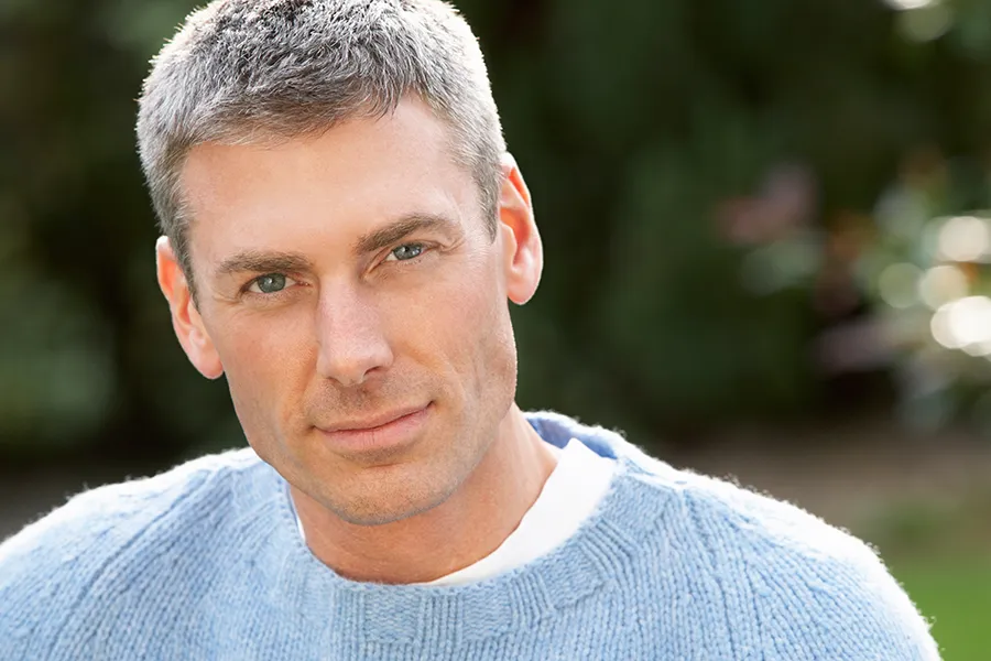 Stem-Cell-Hair-Restoration-Clinic A middle-aged man with short, full salt-and-pepper hair. Get Stem Cell Hair Restoration Therapy from Marina Fay, PA-C in Aventura-North Miami.